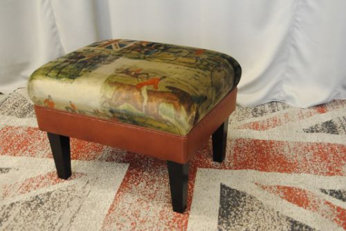 Hocker Germain in stof/leer combinatie.