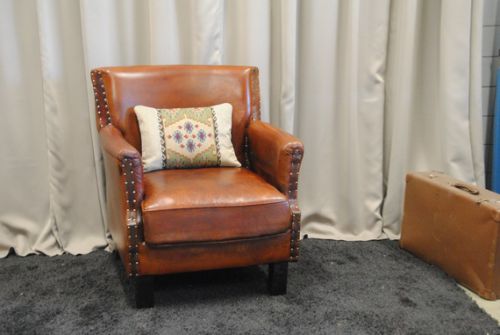 Schapenleren fauteuil.